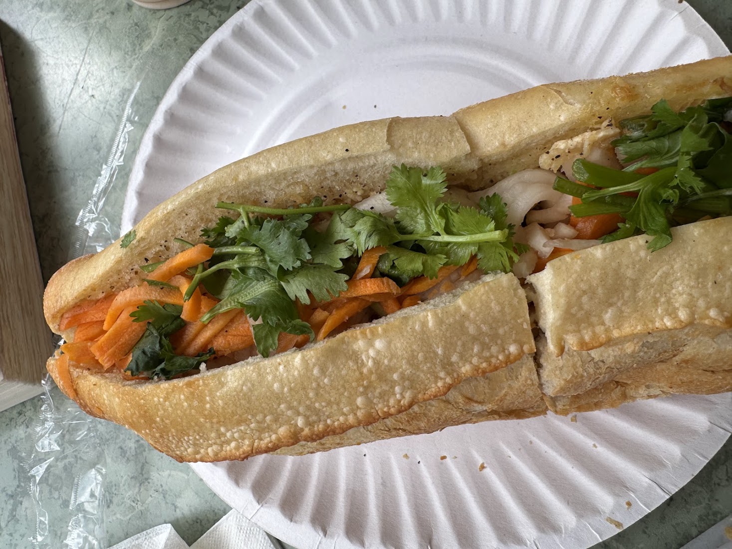 A combination banh mi on a plate